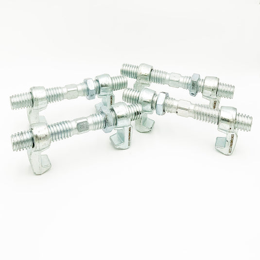 Four silver Bridge Fittings by Container Nut with threads and hexagonal nuts are arranged in a standing position on a gray background. Displaying their gripping mechanism as they open downward, these bolt clamps create a clean and organized appearance.