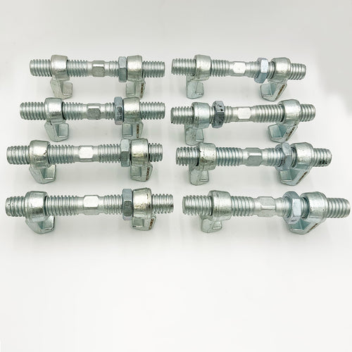 A set of eight silver Bridge Fittings by Container Nut arranged in two rows on a gray background. Each fitting includes a hexagonal nut at each end. The fittings appear clean and uniformly made, featuring shiny, galvanized surfaces.