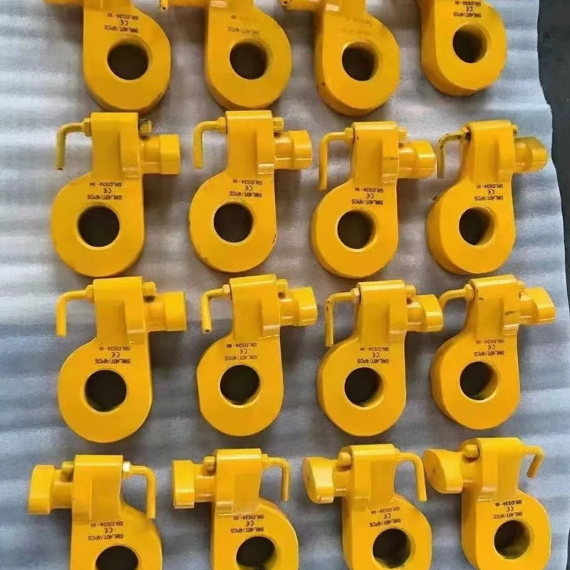 Load image into Gallery viewer, A grid of yellow Bottom Lifting Lugs by Container Nut arranged in five rows on a white surface. Each lifting lug features a round hole with a hook mechanism and has text inscribed on the top part.
