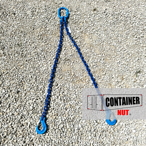 A blue three-legged Chain Sling + Right/Left Hooks Bundle with a central ring and hooks at each end is laid out on a gravel surface. The bottom right of the image contains a logo with a container illustration and the text 