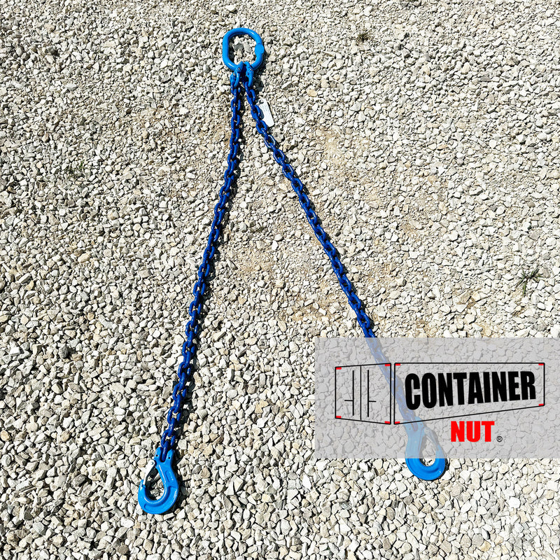 Load image into Gallery viewer, A blue three-legged Chain Sling + Right/Left Hooks Bundle with a central ring and hooks at each end is laid out on a gravel surface. The bottom right of the image contains a logo with a container illustration and the text &quot;Container Nut&quot;.
