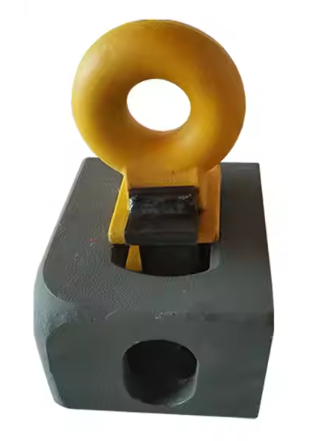 Yellow Shipping Container Top Lifting Lug inserted into dark ISO Corner Casting.