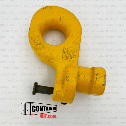 A yellow Bottom Lifting Lug, designed by Container Nut for securing shipping containers, with a cylindrical pin extending from its base. The background features a repeated watermark with the text "CONTAINER NUT®". The "CONTAINER NUT.COM" logo is also visible in the lower left corner.
