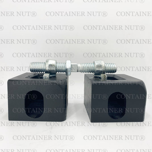 Two silver rectangular blocks with holes and threaded bolts secured with nuts placed on top, resembling bridge fittings, set against a grey background with ""Container Nut®"" repeatedly printed in grey. 
